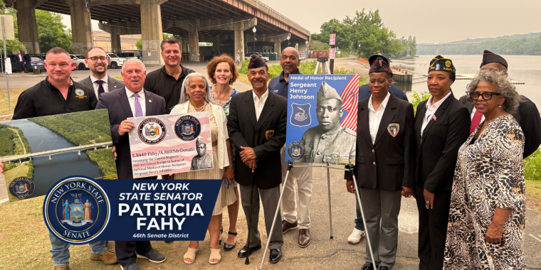 group photo in front of Patroon Island Bridge, soon to be Sgt. Henry Johnson bridge