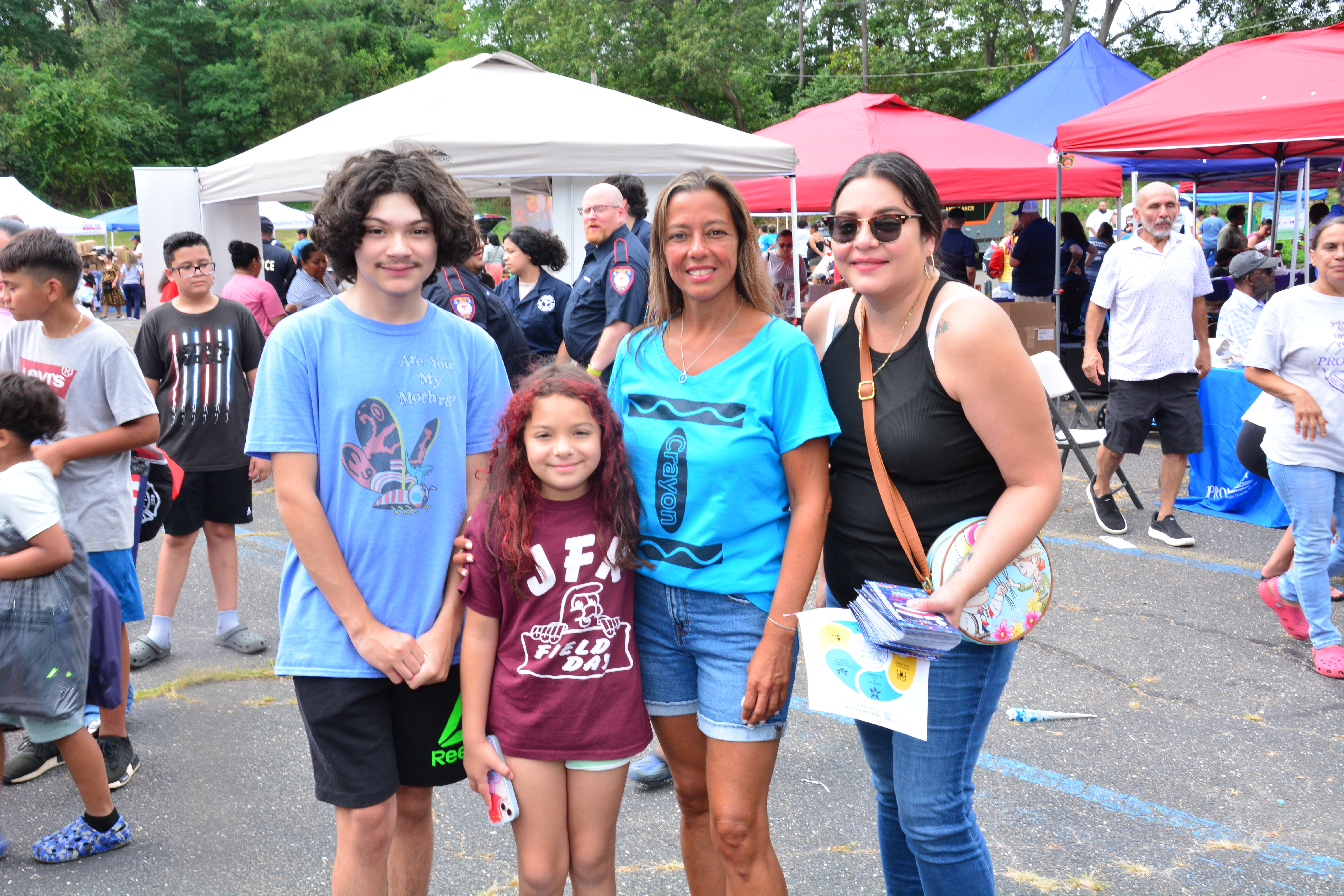 Photo of Sen. Martinez with a family during the Brentwood backpack and school supply event on Saturday, Aug. 16, 2025.