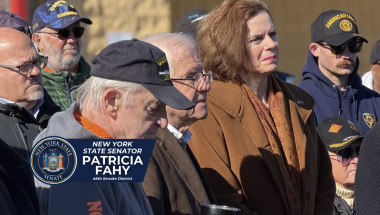 Senator Fahy standing with Schenectady veterans