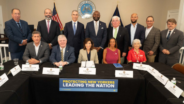 Photo image of Gov. Hochul, Sen. Martinez, business, environmental and issue advocacy leaders from Long Island at table during forum on data center development