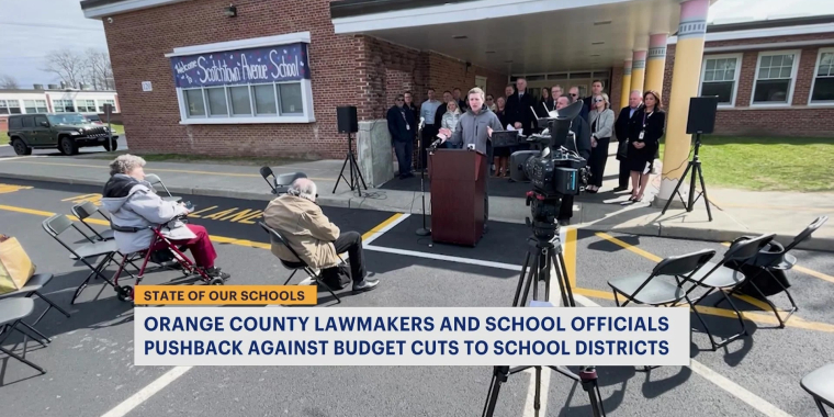 Sen. Skoufis speaking in front of Scotchtown Avenue Elementary School.