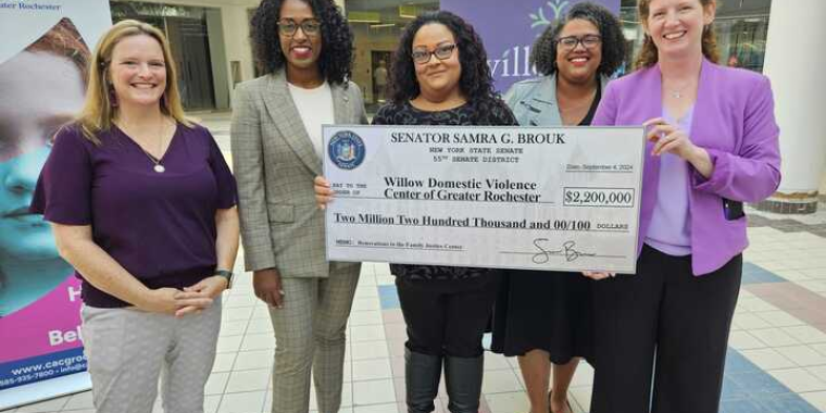 Brouk and Clark with community leaders