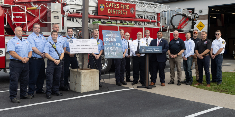 Senator Cooney Stands with Members of Gates Fire District