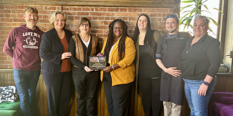 Senator Lea Webb Honors Lost Dog Cafe & Lounge with the New York State Senate Empire Award