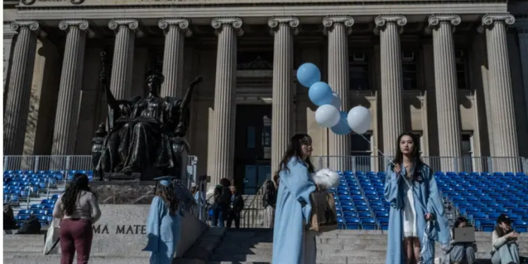 Recent graduates at Columbia University (Stephanie Keith/Getty Images)