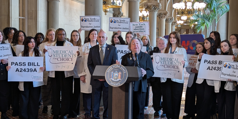 Senator Krueger stands with supporters of the Abortion Clinical Training Program Act.