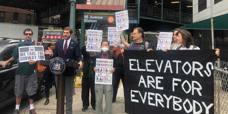 Senator Andrew Gounardes rallying in support of accessible subway stations.