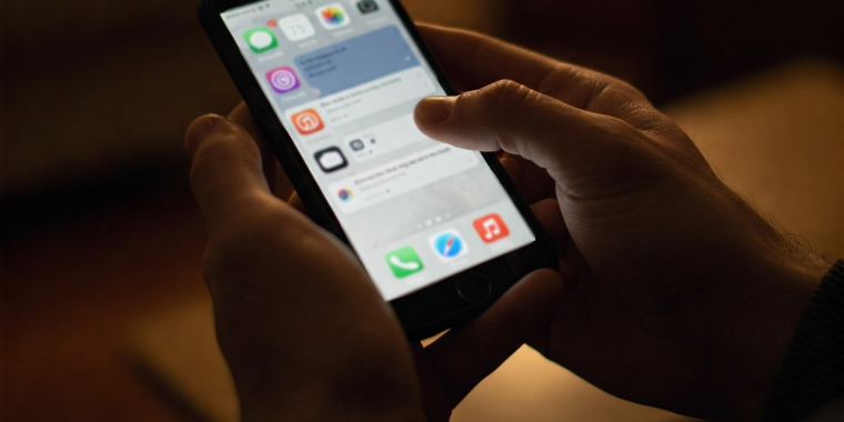 Photo Image of a person using a cell phone.