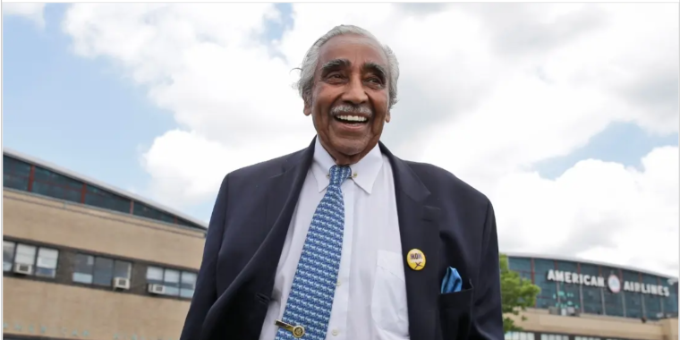 Rep. Charlie Rangel standing outside LaGuardia Airport 