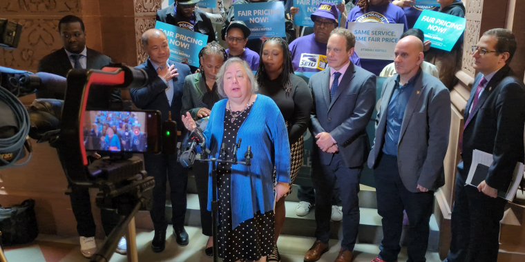 Senator Krueger speaks at a press conference for the Fair Pricing Act