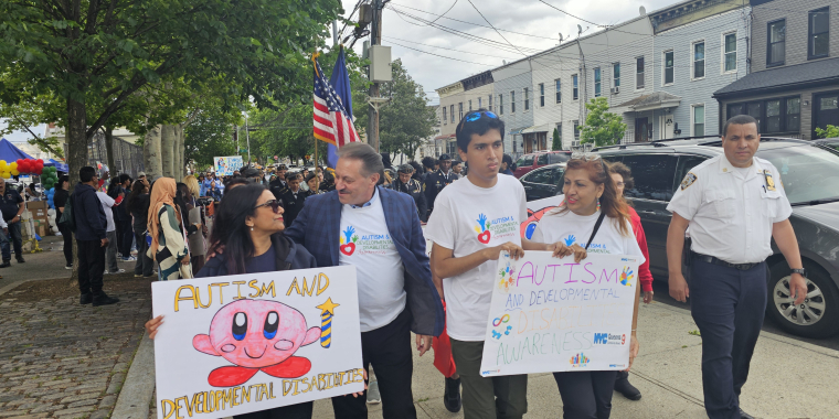 Senator Addabbo and CB 9 Chairwoman Sherry Algredo lead a walk to raise awareness about autism and developmental disabilities.