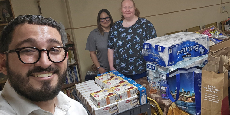 Senator Addabbo's Chief of Staff Raimondo Graziano drops off supplies at Sacred Heart Pantry.
