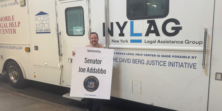 William Steiner, staff attorney for NYLAG, was on site to help constituents.
