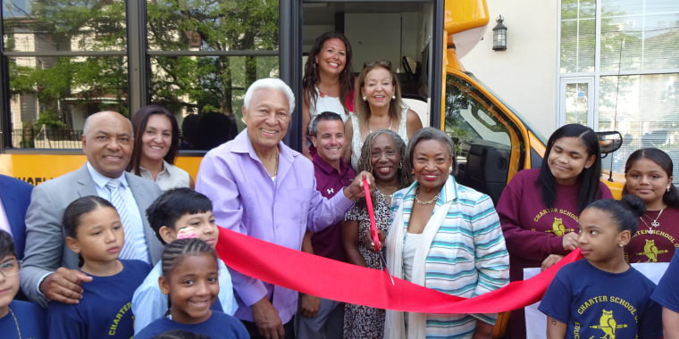 ASC Cuts Ribbon After Funding Purchase of Two Minibuses