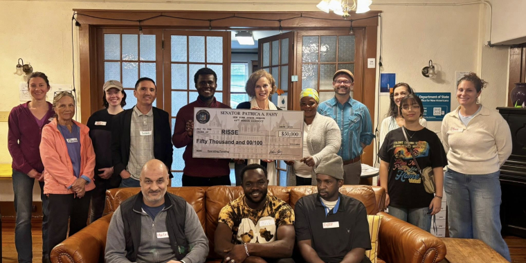 Senator Fahy with a group of new english language learners at RISSE in Albany