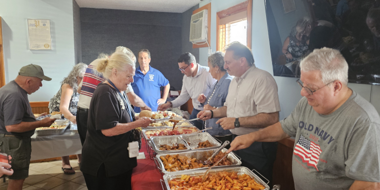 Senator Addabbo and his staff helped serve the food.