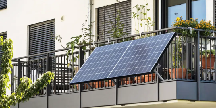 Solar panels attached to a balcony