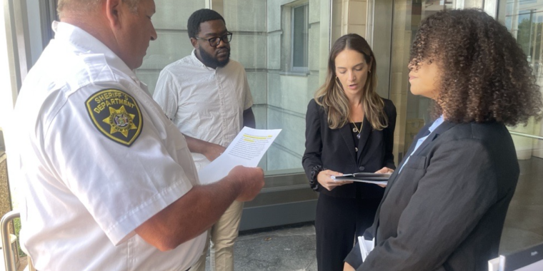 Senator Salazar and Assembly Solages read Section 500-J of the New York State Correction Law to East Meadow Jail facility officials.