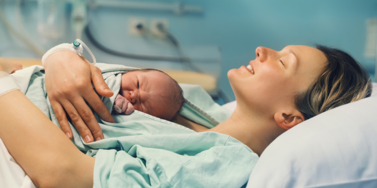 A picture of a mother with her newborn.