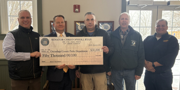 Senator Ryan stands with Onondaga County Parks representatives to present a $50,000 grant check