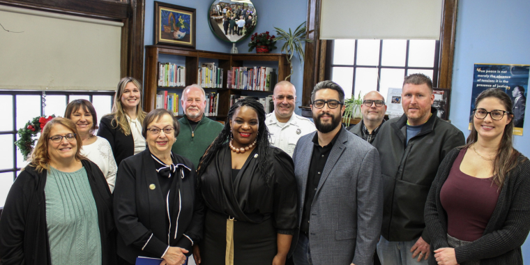 Senator April Baskin with local officials in Carnegie Library in Lackawanna, NY