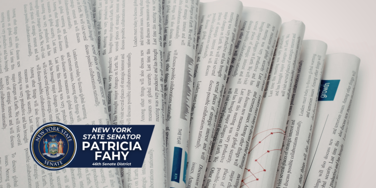 Stack of newspapers w Sen Fahy logo