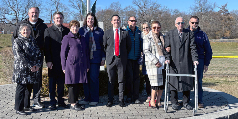 Several officials and members of the Barletta Family, stood together in Maybrook’s Veterans Memorial Park for the highway dedication to Jack Barletta.