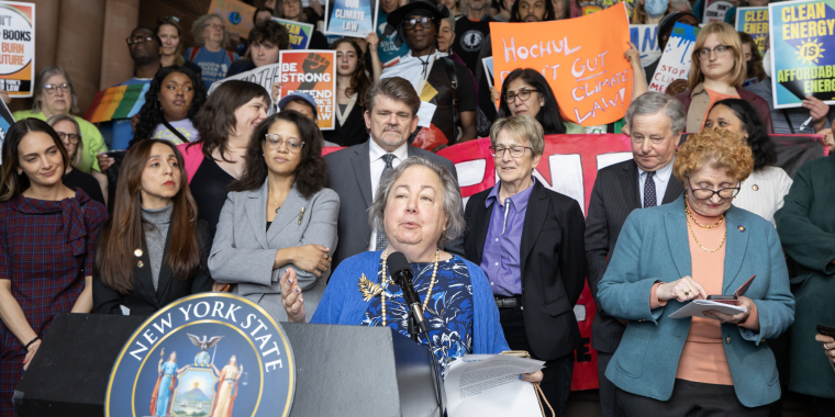 Sen. Krueger speaks at a rally to protect CLCPA