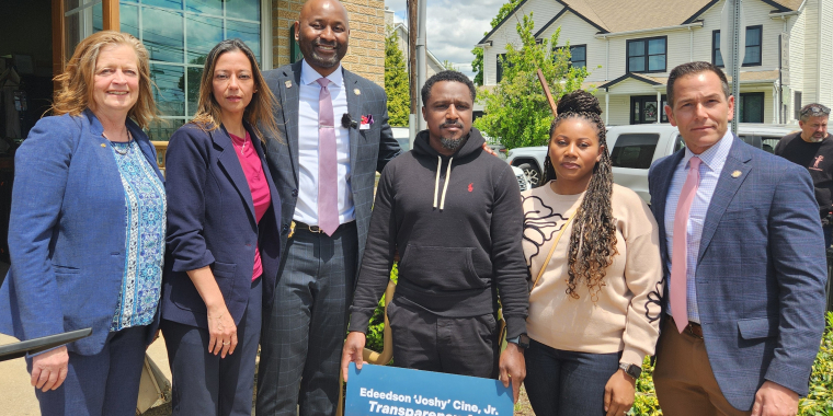 New York State Senator Monica R. Martinez stands with elected officials and family members of a slain CVS Worker during a press conference calling for the passage of the Edeedson Ciné, Jr. Transparency Act