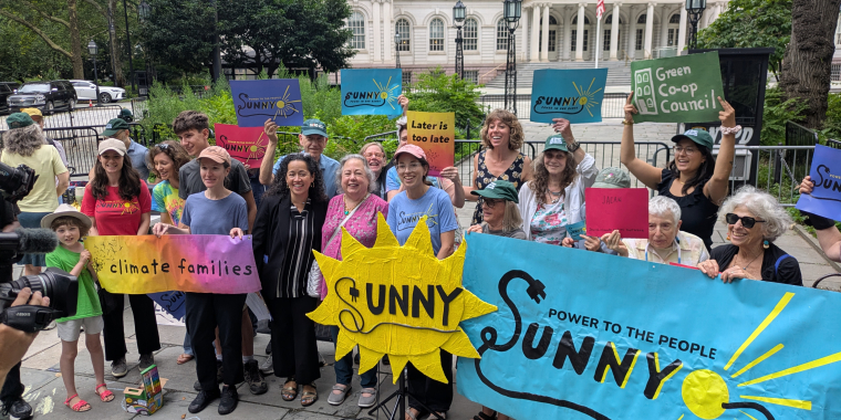 Senator Krueger stands with advocates supporting the SUNNY Act