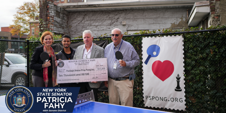 Senator Fahy with stakeholders at the Postage Stamp Ping Pong park in Albany