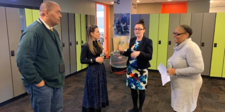 Senator Biaggi speaks with Cooperative Home Care Associates