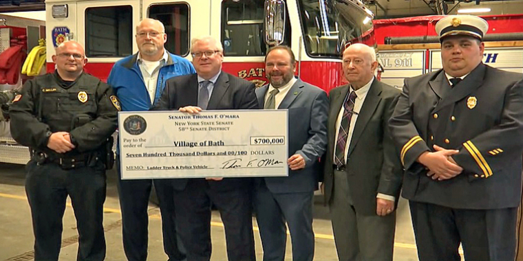 Earlier today at the Bath Volunteer Fire Department, from left to right: Bath Police Chief Chad Mullen, Bath Mayor William von Hagn, Senator O’Mara, Assemblyman Palmesano, Bath Town Supervisor Ronald Smith, and Bath Fire Chief Matthew Glashauser.]