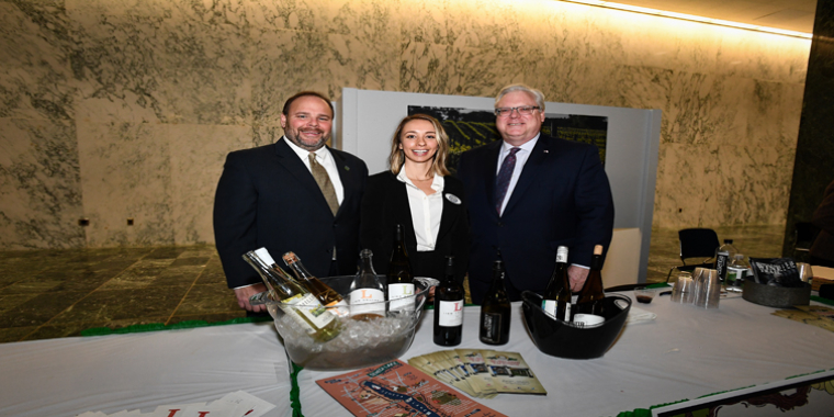 In the photo above at this year’s Sip and Sample, from left to right: Assemblyman Palmesano, Erica Paolicelli (NYWIA President and Co-owner of Three Brothers Wineries & Estates in Geneva), and Senator O’Mara.